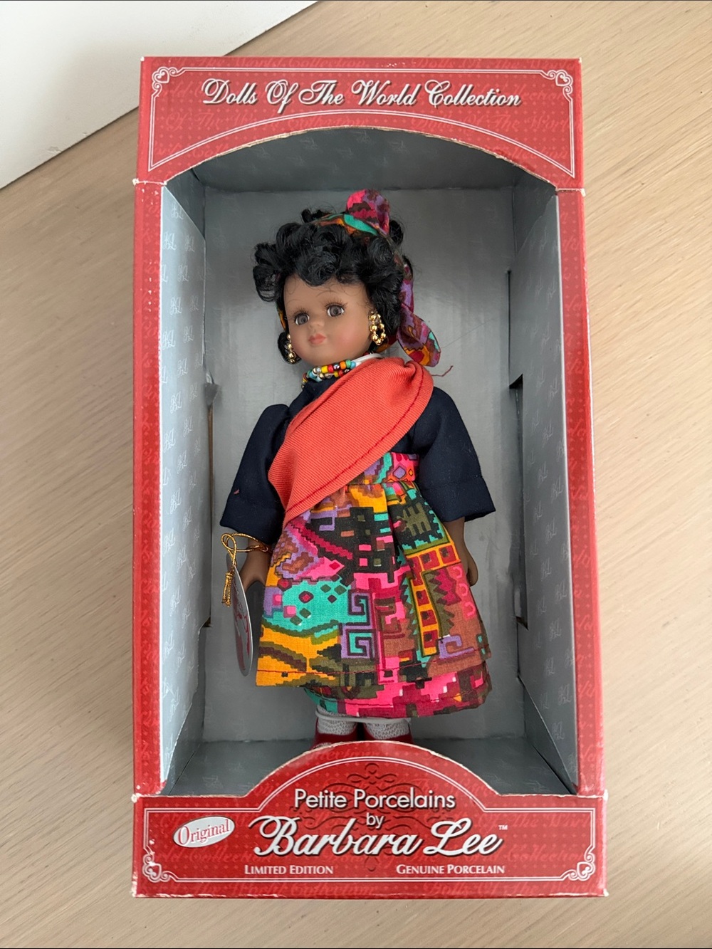 Petite Porcelain Doll in Multicolor Traditional Outfit
